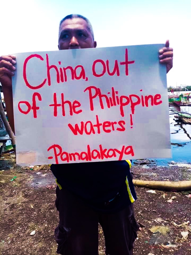 Fisherfolk from Bacoor City call for "China, Out of Philippine Waters!" in marking the 2020 Earth Day.