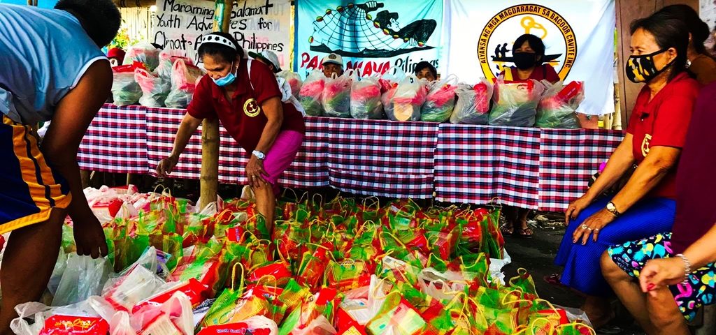 "Nutri-lief" distribution (composed of 8 kg rice, nutritious vegetables and more) at a Bacoor City fisherfolk community by Youth Advocates for Climate Action Philippines (YACAP), Tulong Anakpawis and Sagip Kanayunan.